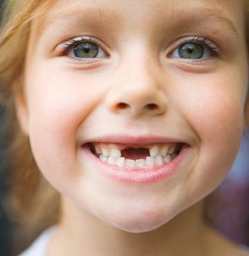 Why does my child need their baby tooth removed?